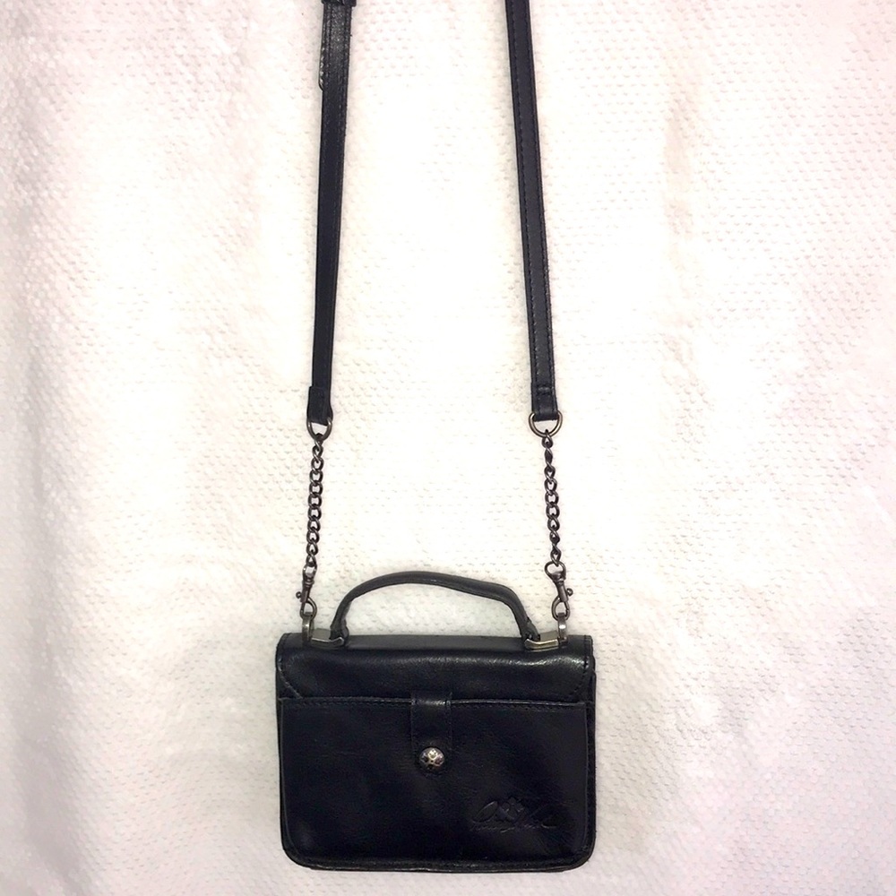Wonderful Patricia Nash crossbody black leather bag.